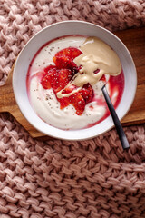 Fresh healthy breakfast greek yogurt with blood oranges, cashew butter and chia seeds