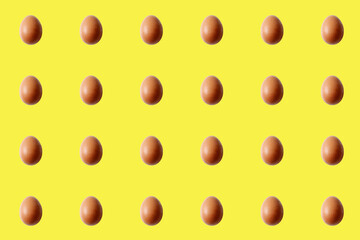 brown egg patter on yellow background
