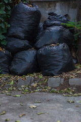 Garbage bags with nature background.