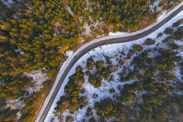 Aerial view on mountain road from drone in