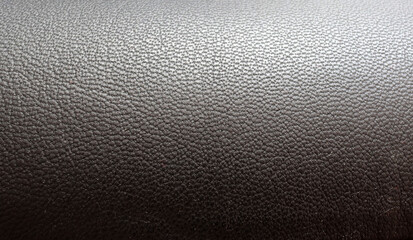 Surface of the leatherette black color for textured background. Top view. close up. decorative background