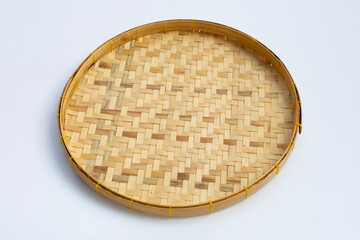 Wooden bamboo threshing basket on white
