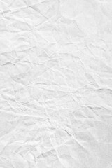 Vertical white crumpled paper surface background texture