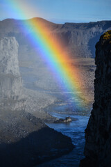 A rainbow inside Jokulsargjlufur canyon, near Dettifoss waterfall, Vatnajokull National Park, Iceland.