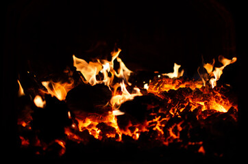 A fire is burning in a coal furnace