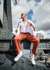 man sitting on a crane