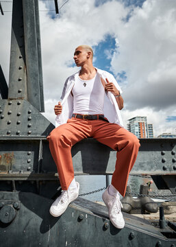 man sitting on a crane