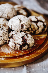  a plate of cakes, only from the oven, sprinkled with powdered sugar
