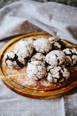 a plate of cakes, only from the oven, sprinkled with powdered sugar