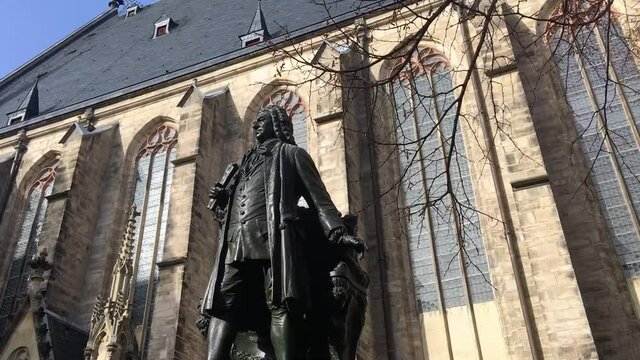 Thomas church and statue of Johann Sebastian Bach in Leipzig, Germany