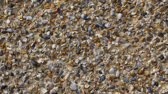 Full frame background of pebble dashed wall with space for copy