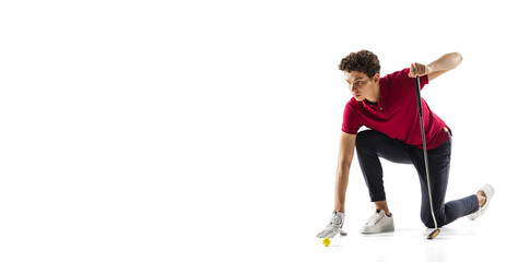 Handsome. Golf player in a red shirt isolated on white studio background, flyer with copyspace. Professional player practicing with emotions and facial expression. Sport, motion, action concept.