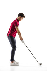 Objective. Golf player in a red shirt isolated on white studio background with copyspace. Professional player practicing with emotions and facial expression. Sport, motion, action concept.