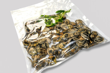 clams vacuum packed sealed for sous vide cooking on white background