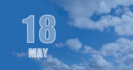 may 18. 18th day of the month, calendar date. White numbers against a blue sky with clouds. Copy space, Spring month, day of the year concept