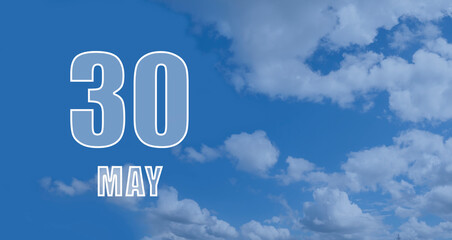 may 30. 30th day of the month, calendar date. White numbers against a blue sky with clouds. Copy space, Spring month, day of the year concept