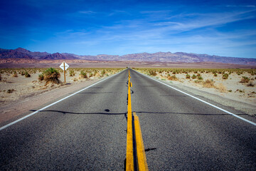 road lines in death valley, california, usa