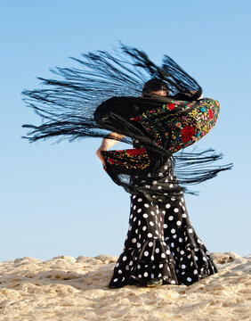 Flamenco dancer dancing on rocks, Malta