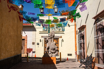 The beautiful town of Peña de Bernal, UNESCO site and one of the world’s largest monoliths looms above Bernal, Queretaro, Mexico