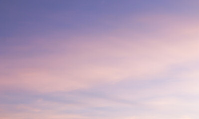 Beautiful image of natural pastel colorful of blue sky and violet clouds in the morning in spring season.  