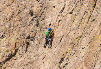 Fototapeta na wymiar A rock climber on Peña de Bernal, UNESCO site and one of the world’s largest monoliths, Queretaro, Mexico