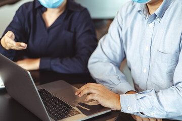 Coronavirus. Business workers wearing protective mask..working together.