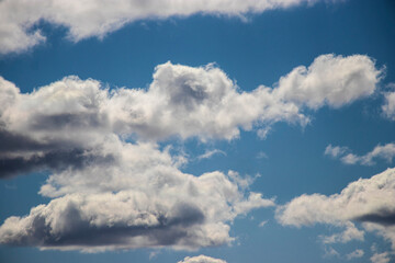 Beautiful blue sky and white cirrus clouds. Background. Texture. Scenery. Material for design.