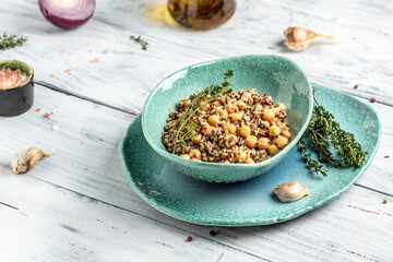 Healthy vegetable lunch from the Buddha bowl with quinoa and chickpeas. healthy food dish for vegetarians. banner format, top view