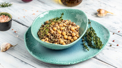 Healthy vegetable lunch from the Buddha bowl with quinoa, chickpeas and thyme. Super food, top view