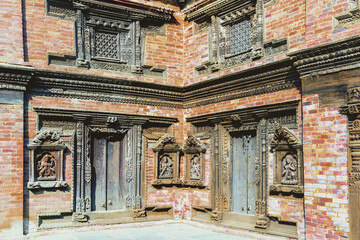 Fototapeta na wymiar Mul Chowk courtyard, Wall carved Statues, Hanuman Dhoka Royal Palace, Patan Durbar Square, Unesco World Heritage Site, Kathmandu valley, Lalitpur, Nepal, Asia