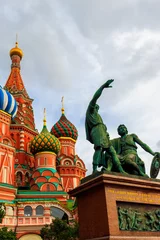 Foto op Canvas Monument of Minin and Pozharsky at front of St. Basil cathedral on Red Square in Moscow, Russia © olyasolodenko