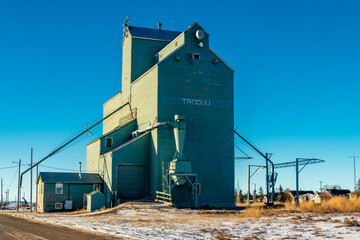 Grain elevator reaches to the sky. Trochu, Alberta, Canada © David