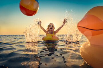 Happy child having fun on summer vacation