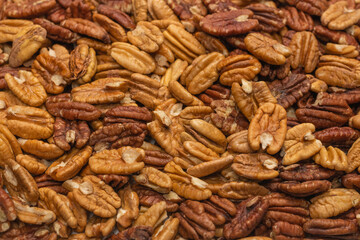 Tasty pecan-nut background. Top view.