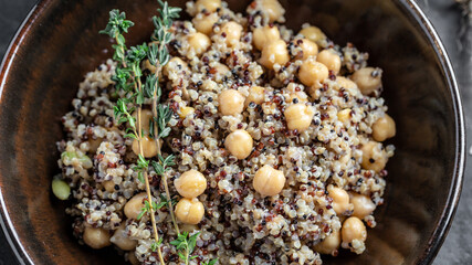 bowl of quinoa salad with chickpeas and thyme. Super food, Food recipe background. Close up