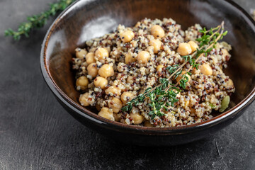 bowl of quinoa salad with chickpeas and thyme. Super food, Food recipe background. Close up