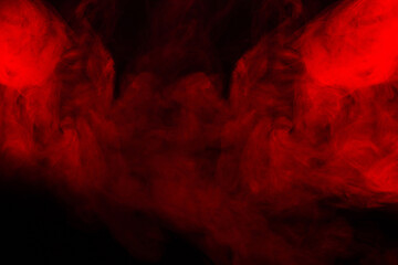 Naklejka na ściany i meble Red steam on a black background.