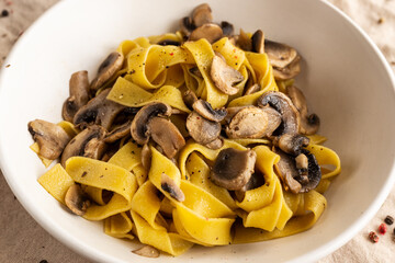 Tagliatelle with mushrooms, typical italian food