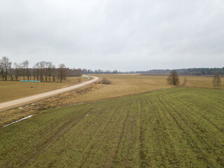 meadow from above where one part of the field is grain