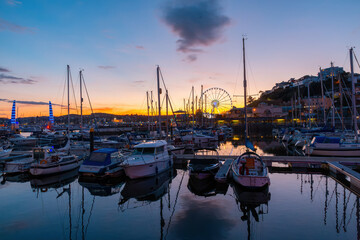 View of the harbor of Torquay at colorful sunset., Devon, England