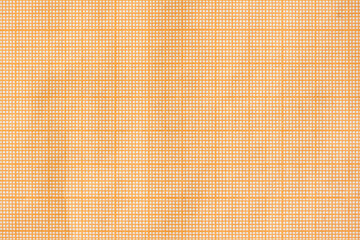 Orange graph grid scale paper. Backround texture. Top close up view.