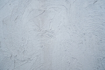 Decorative plaster. Grey wall texture background. Concrete style. Restoration indoors. Maintenance works. Renovation at home.