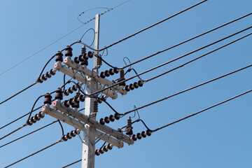 Utility pole with blue sky background
