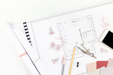 Interior designer table workplace with house plan