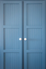 Fototapeta premium Rustic blue cupboard door background