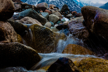 water flowing into the rocks