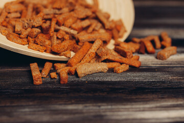 salty croutons snacks delicacy meal wooden table