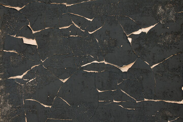 Black texture with bright cracks all over the frame