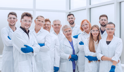 large group of medical researchers standing together