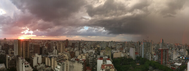 dramatic sunset over Buenos Aires city